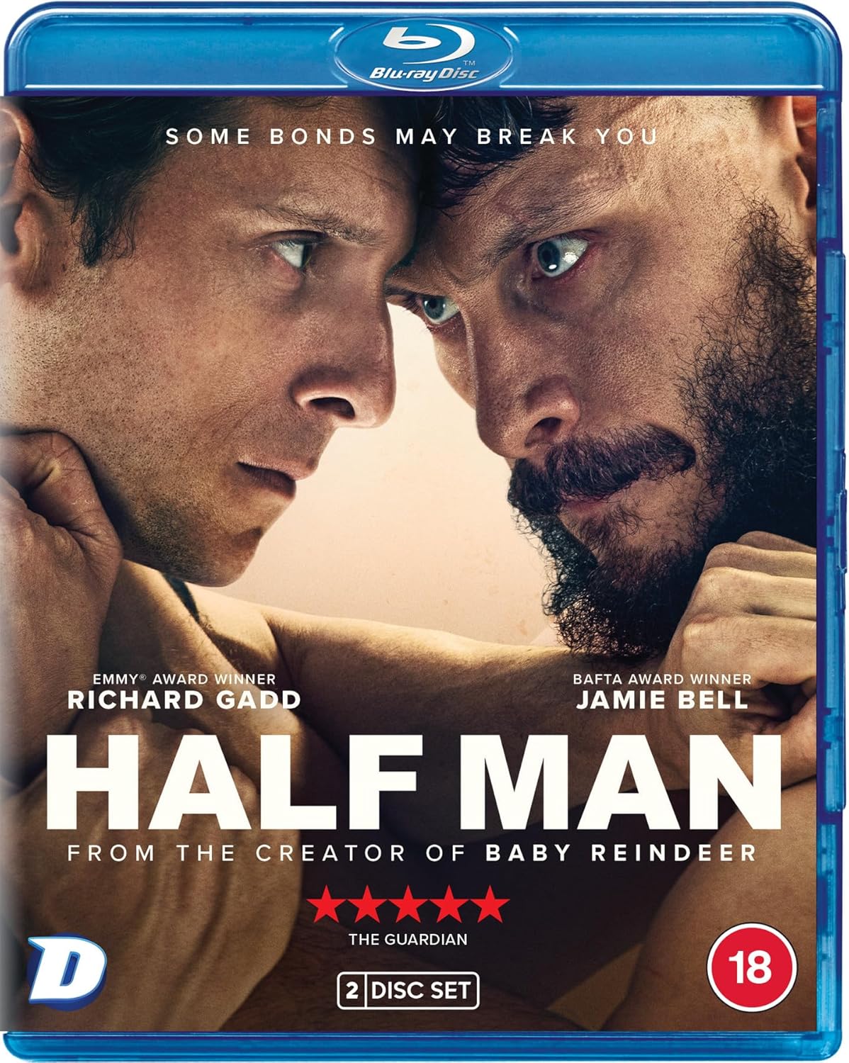 Blu-ray cover for "Half Man" featuring two men in a tense standoff.