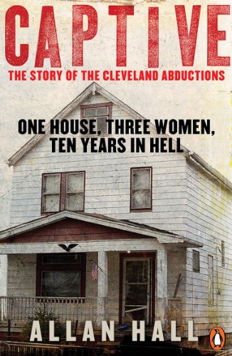 Book cover depicting a dilapidated house, title "Captive" in red text.