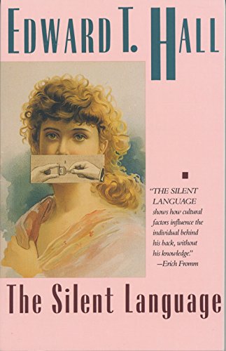 Book cover: woman with hands covering mouth, titled “The Silent Language.”