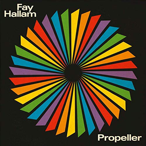 The image shows a vinyl record cover with a black background and a multicolored, radial pattern. For accessibility purposes, a suitable alt text could be: "Black vinyl album cover with multicolored radial pattern and white text."