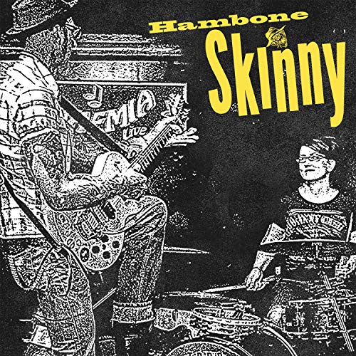 CD cover: black and yellow illustration of musicians playing instruments.