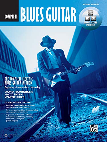 Blues guitar method book cover with a musician playing electric guitar.