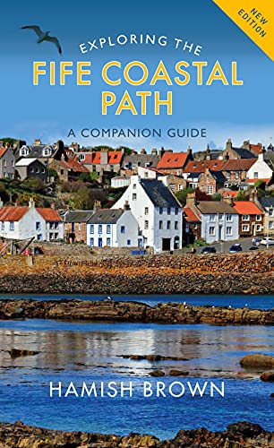 Book cover showing a coastal village with white houses, rocky shoreline, and blue sea.