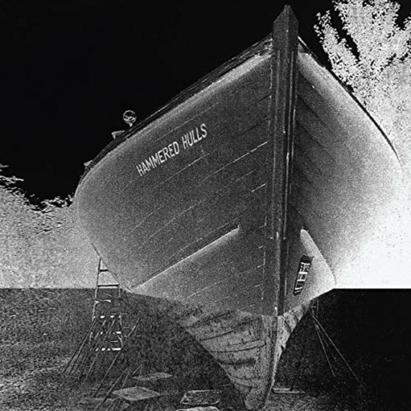 Black and white image of a boat with "HAMMERED HULLS" text.