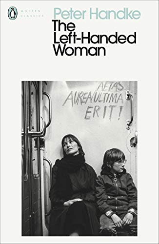 Book cover: two people sit on a subway car with graffiti.