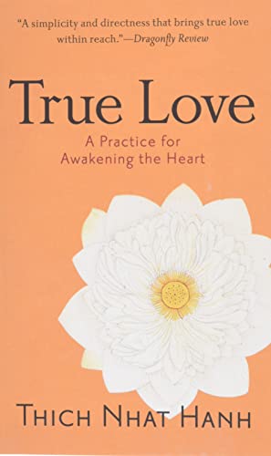 Book cover with orange background, white lotus flower illustration, and title text.
