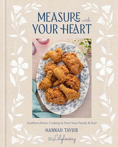 Cookbook cover featuring fried chicken on a plate with floral border and title.