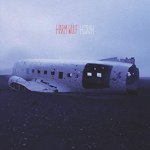 "Album cover featuring a damaged airplane on a dark, rocky landscape."