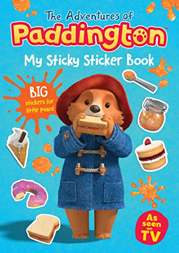 Paddington Bear holding a sandwich, with stickers and marmalade splashes.