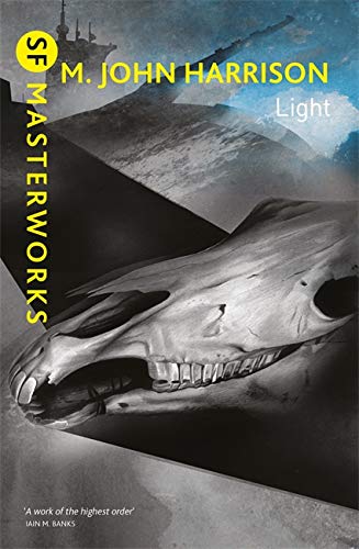 Book cover featuring a horse skull against a dark, abstract background with yellow text.