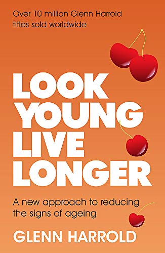 Book cover with large white text, cherries, and orange background.