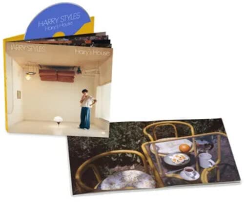 Harry Styles' "Harry's House" CD case featuring a man in a room.
