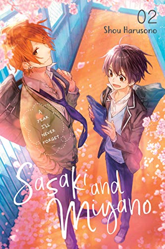 Manga cover with two young men and falling pink cherry blossoms.