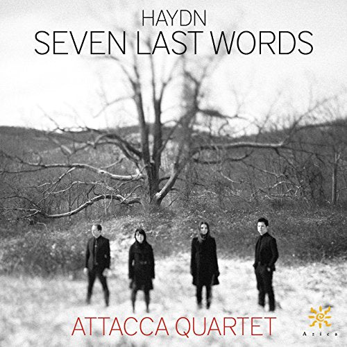 CD cover: quartet stands before a stark, leafless tree on a hill.