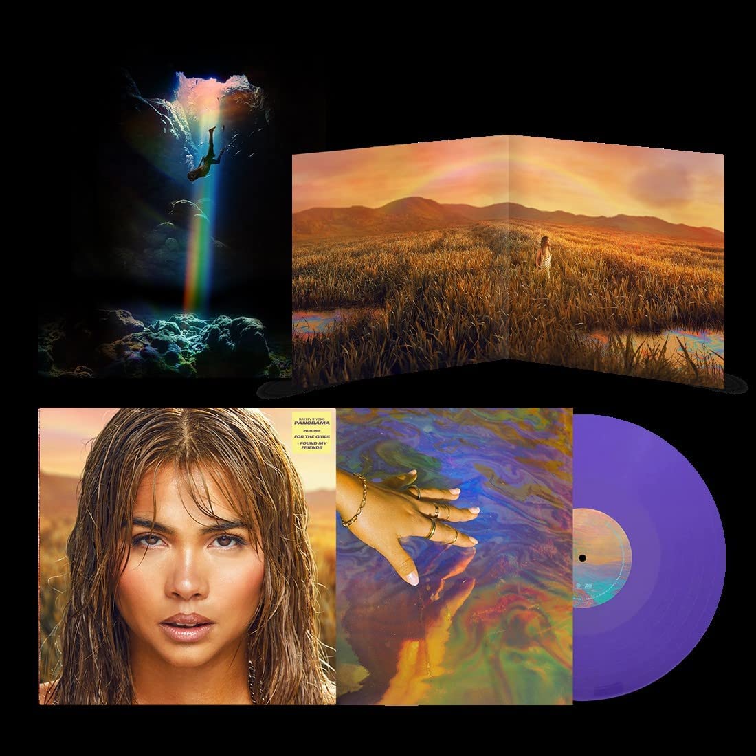 "Purple vinyl record with multicolored sleeve and album artwork featuring a woman and landscape."