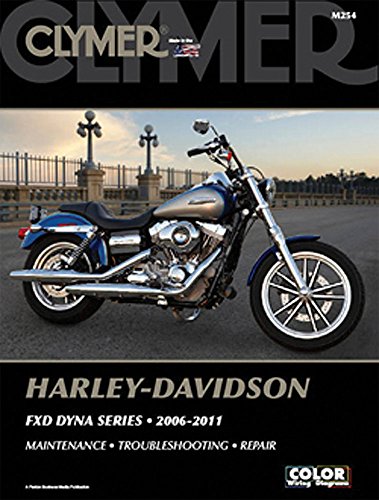 Clymer repair manual cover featuring a blue Harley-Davidson FXD Dyna S motorcycle.