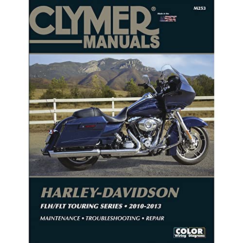 Clymer manual cover featuring a dark blue Harley-Davidson touring motorcycle.