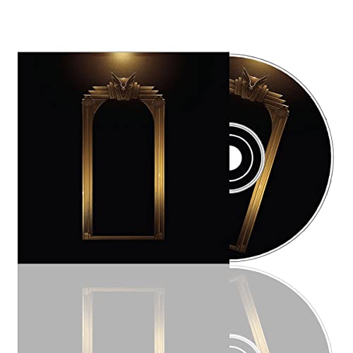 CD case and disc with a gold, ornate frame on a black background.