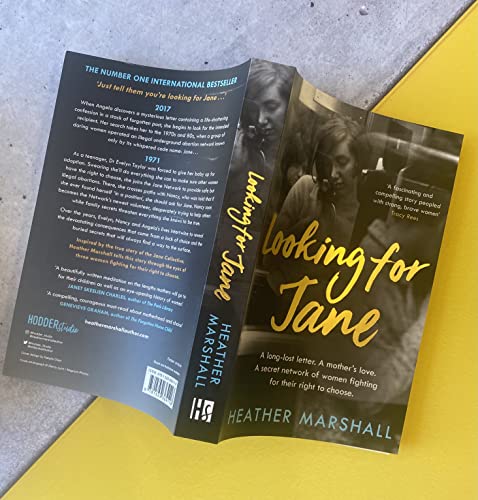 Book cover: "Looking For Jane" by Heather Marshall, with a vintage photo.