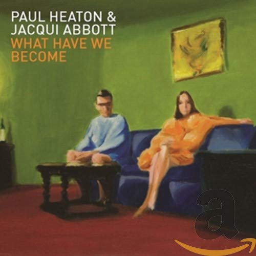 Album cover featuring a man and woman in a green room setting.