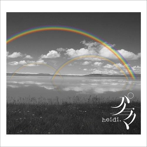 CD cover: black and white landscape with a colorful rainbow and text.