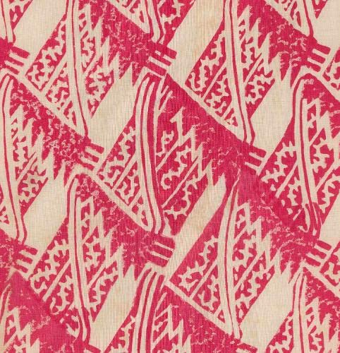 Red and white patterned textile, close-up of geometric design.