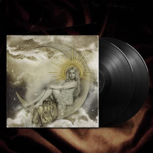 Vinyl record and album cover featuring a woman with a crescent moon.