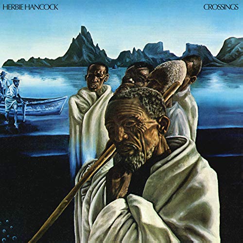 Album cover art showing men in white robes near a boat and mountains.