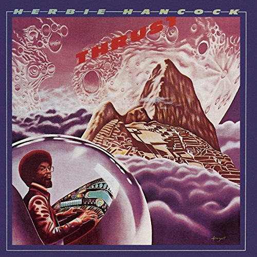 Herbie Hancock’s “Thrust” album cover: surreal landscape with musician portrait.