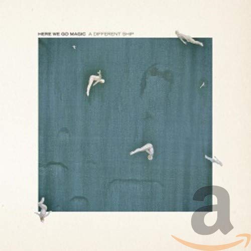 Album cover: people swimming underwater in teal, with white text above.