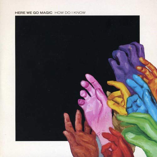 Here We Go Magic album cover with colorful, painted hands reaching up.