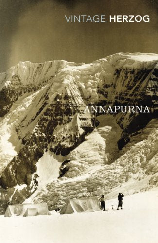 Book cover showing two climbers at a base camp beneath a massive snow-covered mountain.