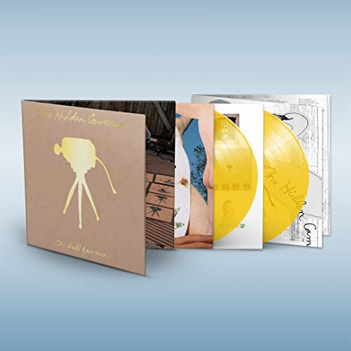 The Hidden Cameras vinyl album set with brown cover and two bright yellow records.