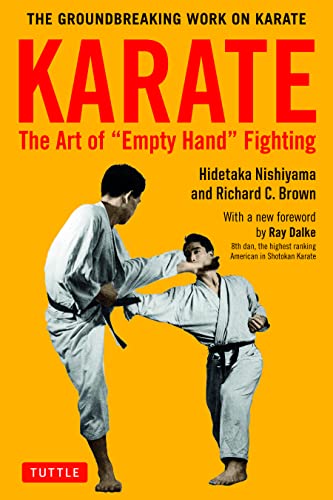 Yellow book cover featuring two karate practitioners in white gis.