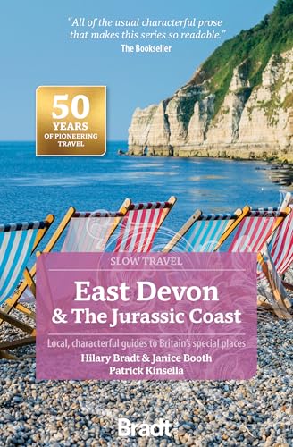 Travel guide cover featuring beach chairs and coastal cliffs.