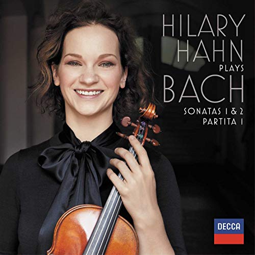 Hilary Hahn portrait with violin, album cover for Bach sonatas.