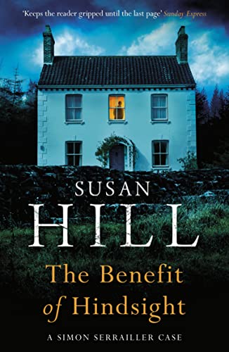 Book cover: a pale blue house with a lit window, dark text.