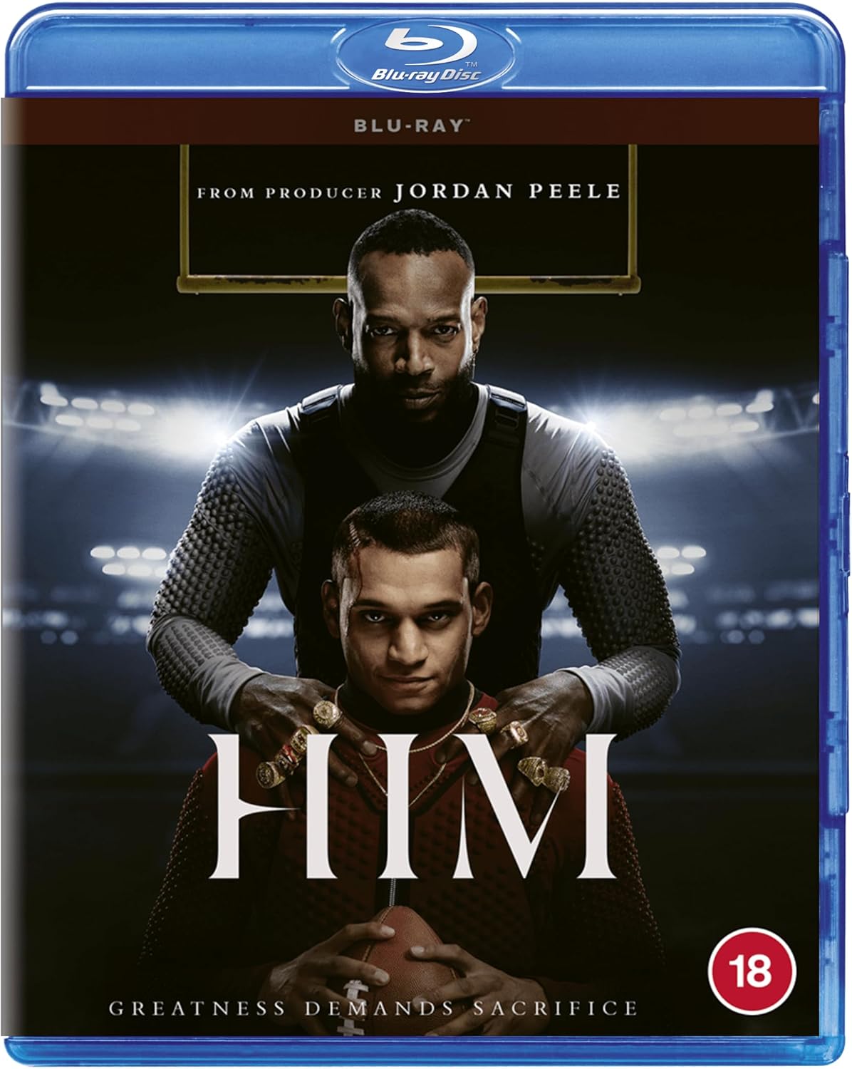 HIM" Blu-ray cover featuring two men in athletic wear, dark background.