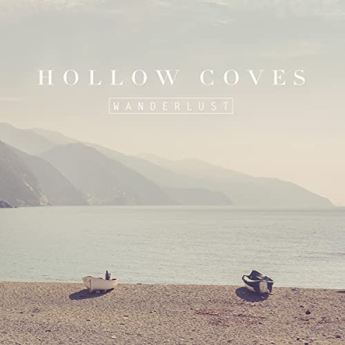 Hollow Coves Wanderlust" vinyl album cover with a coastal mountain landscape.