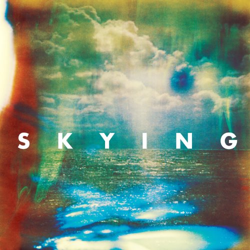 Album cover for The Horrors' "Skying" featuring clouds and water.