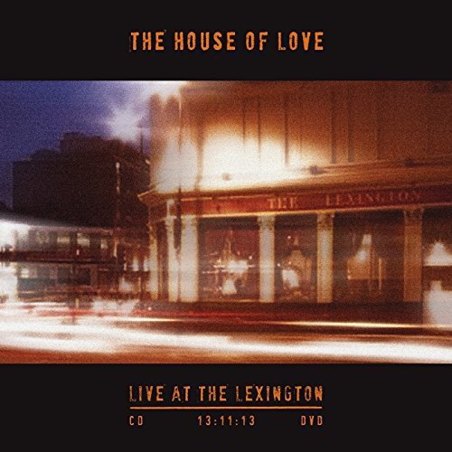"Album cover with a blurry nighttime photo of a building with 'Lexington' sign."