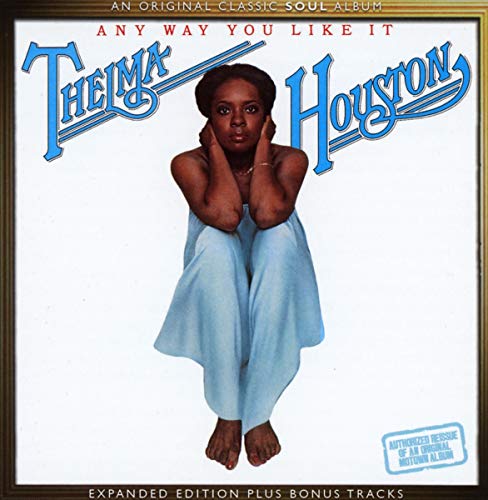 Thelma Houston album cover, seated woman in blue, gold frame.