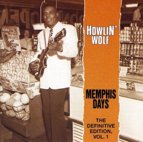 Howlin’ Wolf CD cover featuring a vintage photo of the musician with a guitar.