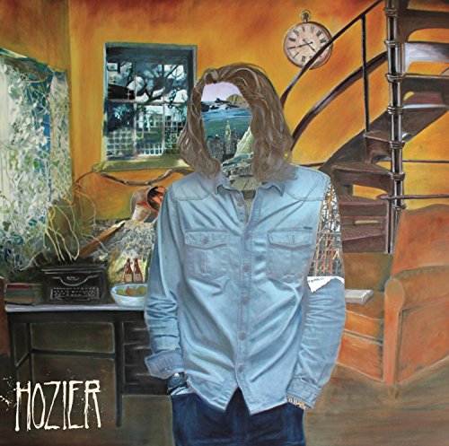 Hozier album cover: man with obscured face in a painted room.