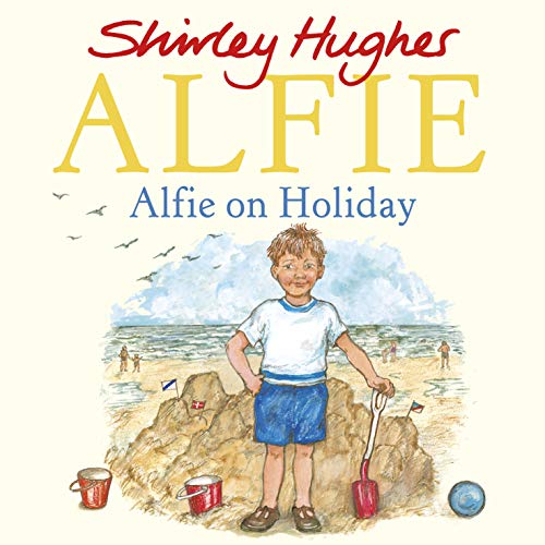 A young boy stands on a beach with sandcastles, buckets, and a spade.