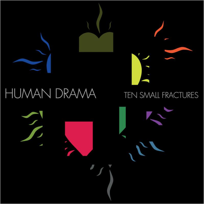 Album cover with colorful abstract shapes arranged in a circle on a black background.