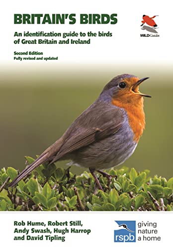 Book cover for Britain's Birds featuring a European robin perched on a green bush.