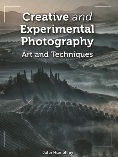 Photography book with colorful cover, techniques and art examples, on a neutral background.