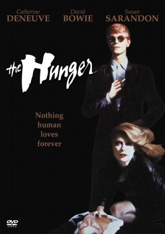 DVD cover for The Hunger featuring David Bowie and Catherine Deneuve against black background.