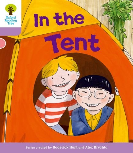 Children peeking from inside a bright orange and yellow tent.